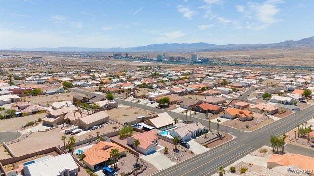 bird's eye view featuring a residential view and a mountain view