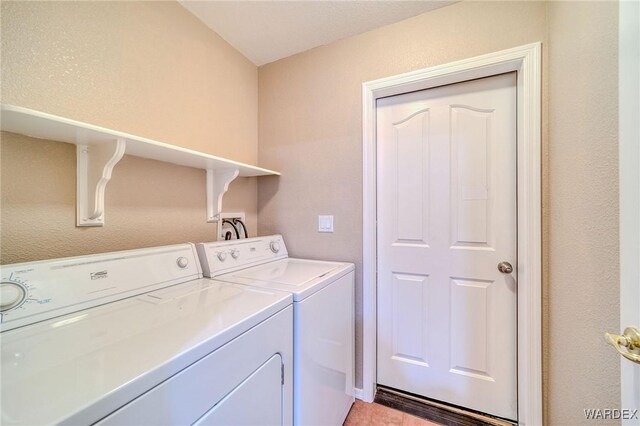 laundry area featuring laundry area and washing machine and clothes dryer