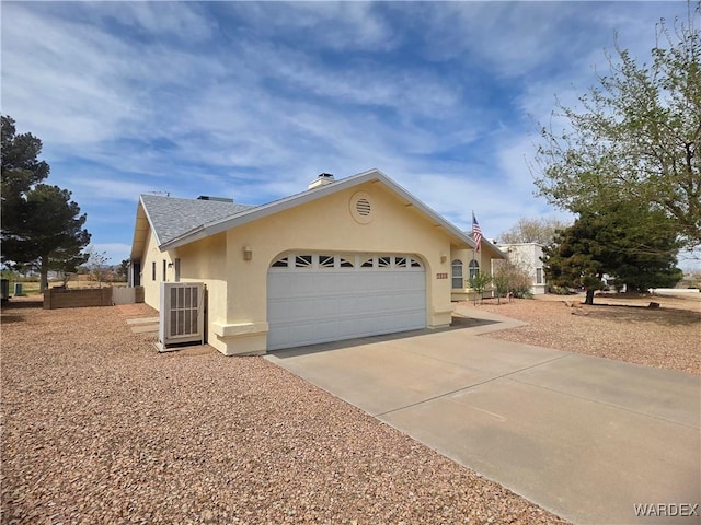 view of property exterior with an attached garage, a shingled roof, driveway, and stucco siding