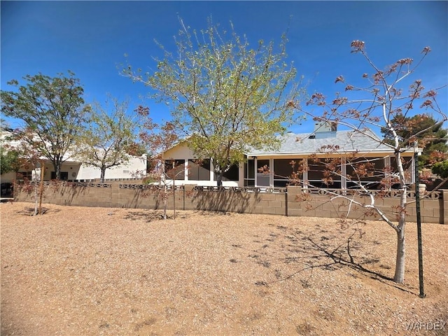 view of front of home with fence