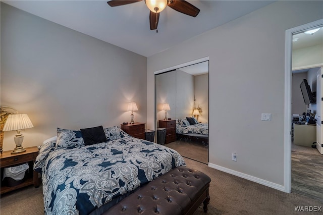 carpeted bedroom featuring ceiling fan, a closet, and baseboards