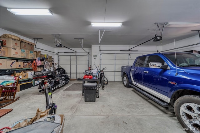 garage featuring a garage door opener