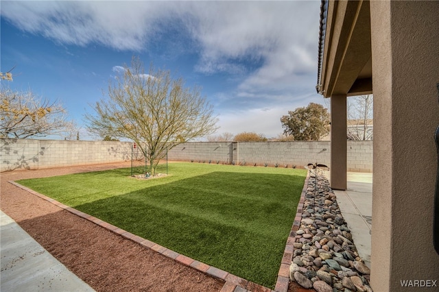 view of yard with a fenced backyard