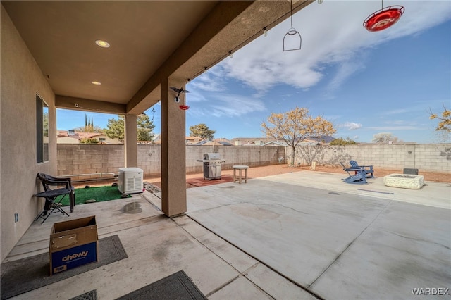 view of patio / terrace featuring a fenced backyard and area for grilling