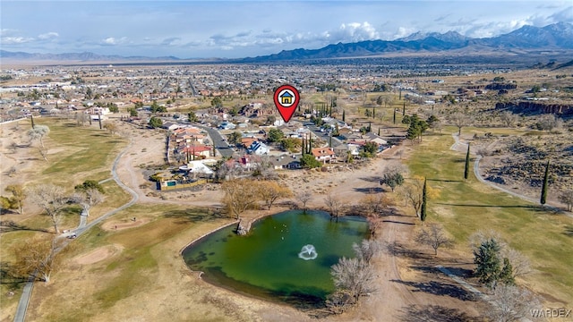 aerial view with a residential view and a water and mountain view