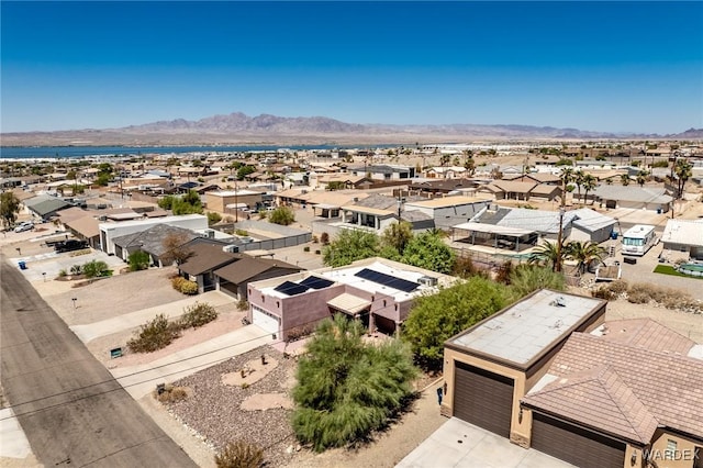 bird's eye view with a residential view and a mountain view