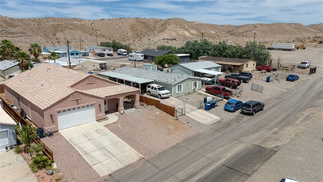 1919 Richardo Ave, Bullhead City, AZ 86442 - aerial perspective of suburban area featuring a mountain backdrop