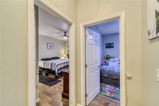 1919 Richardo Ave, Bullhead City, AZ 86442 - hall with wood finished floors and a textured wall