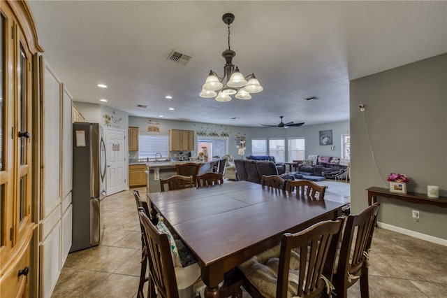 1919 Richardo Ave, Bullhead City, AZ 86442 - dining area featuring a chandelier, light tile patterned floors, recessed lighting, a ceiling fan, and baseboards