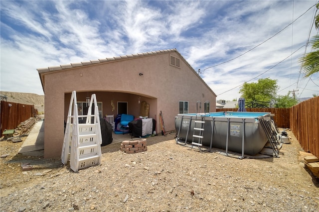 1919 Richardo Ave, Bullhead City, AZ 86442 - rear view of house featuring stucco siding and a fenced backyard