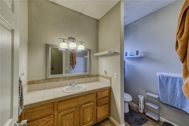 1919 Richardo Ave, Bullhead City, AZ 86442 - bathroom with toilet and vanity