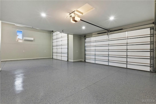 garage with baseboards and a garage door opener