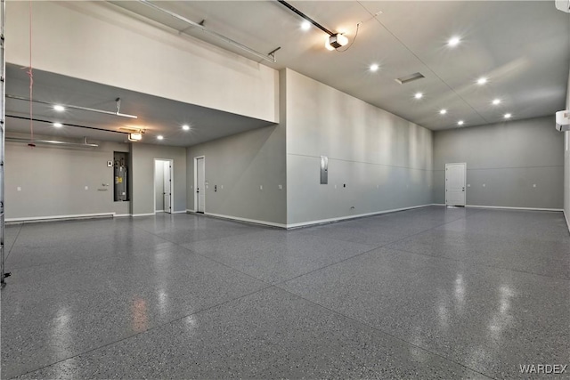 garage with visible vents and baseboards