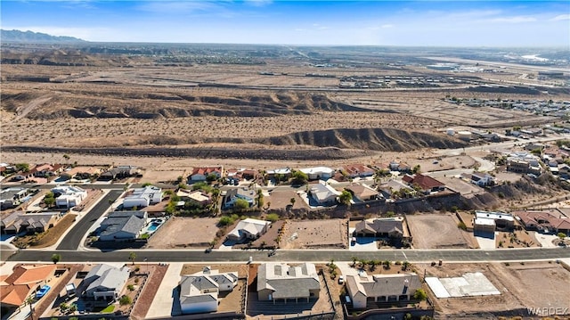 aerial view with a mountain view and a residential view