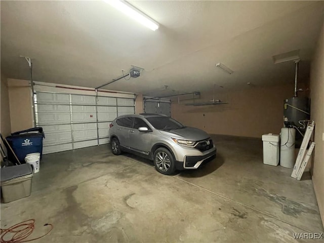 parking garage featuring a garage door opener