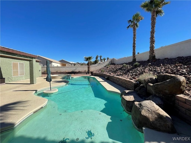 view of pool with a fenced in pool and a fenced backyard