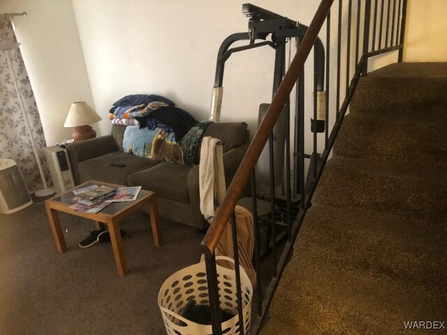 interior space featuring carpet and stairway