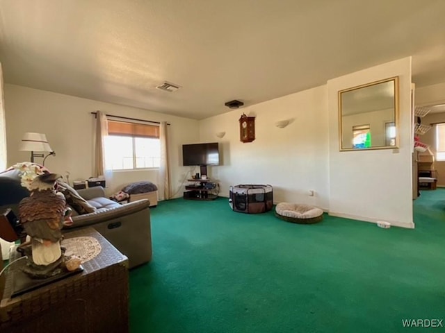 carpeted living area with visible vents