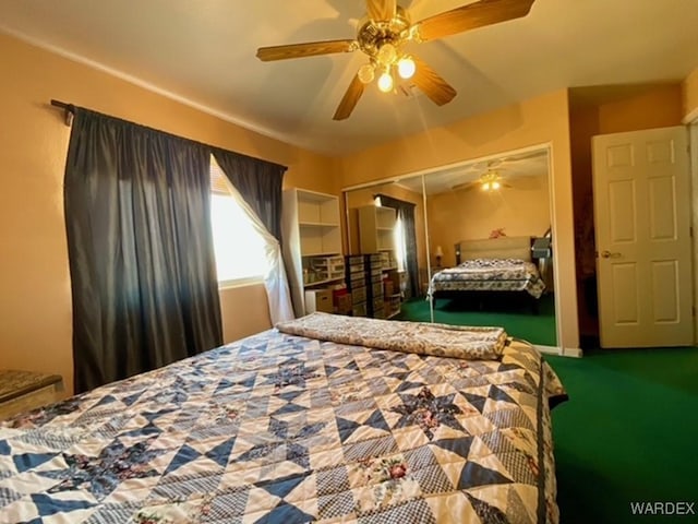 bedroom with a closet, carpet, and a ceiling fan