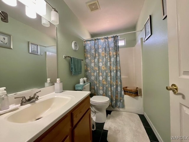 full bathroom featuring shower / tub combo with curtain, visible vents, toilet, vanity, and tile patterned flooring