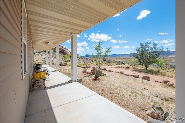 view of patio with a mountain view