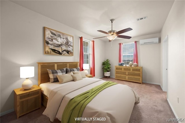 bedroom with visible vents, baseboards, an AC wall unit, carpet flooring, and a ceiling fan