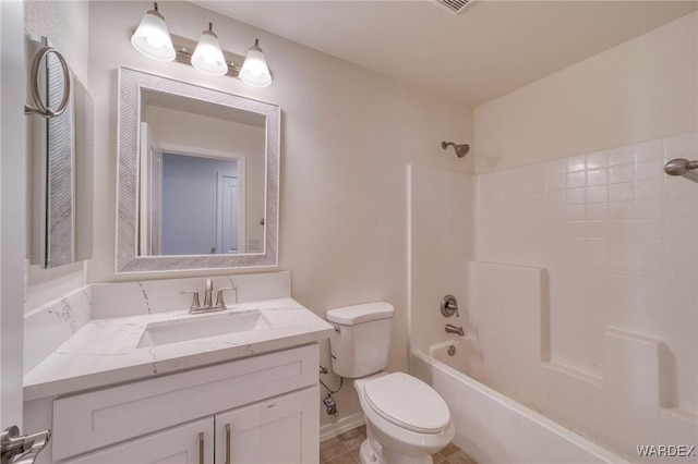 full bath featuring bathing tub / shower combination, vanity, and toilet