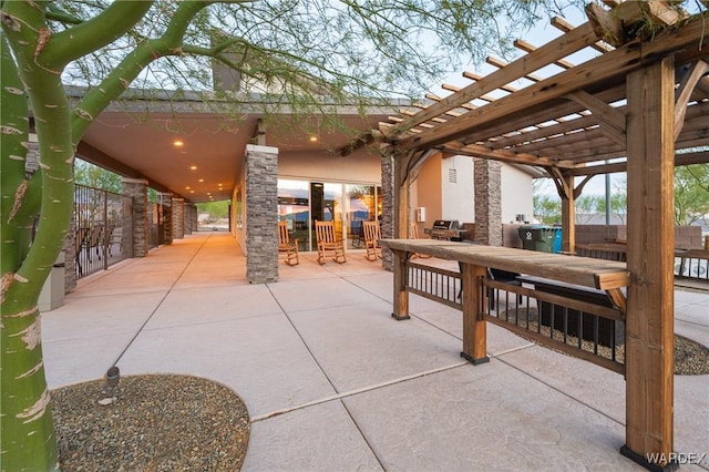 view of patio / terrace with outdoor dining area and a pergola