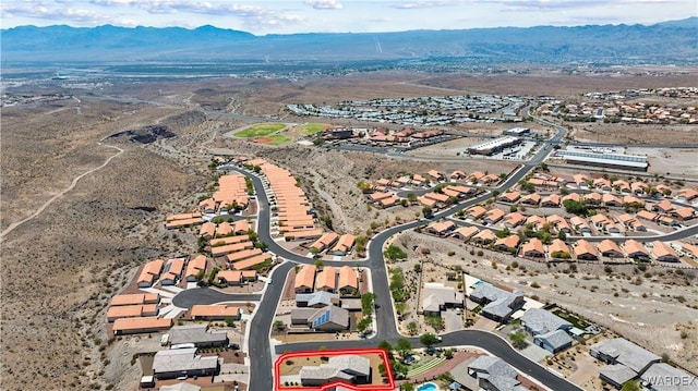 bird's eye view with a residential view and a mountain view