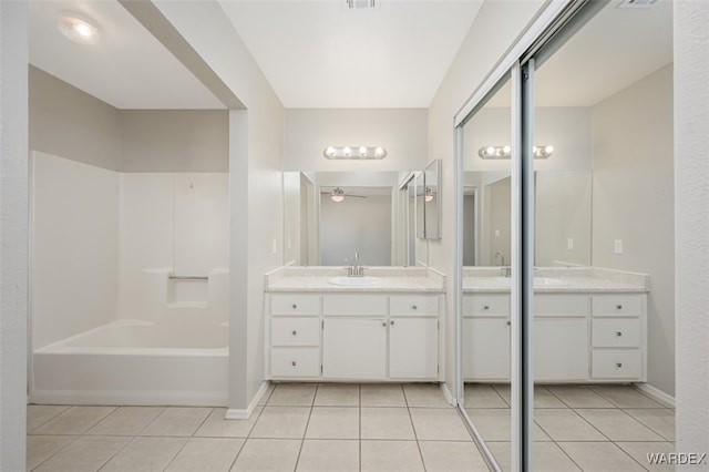 full bath featuring a ceiling fan, tile patterned flooring, visible vents, and vanity