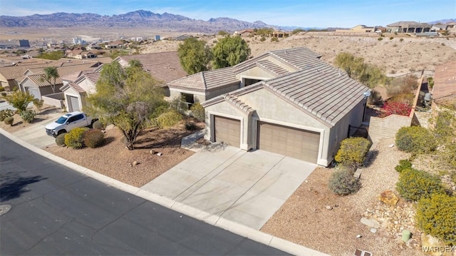 bird's eye view featuring a residential view and a mountain view