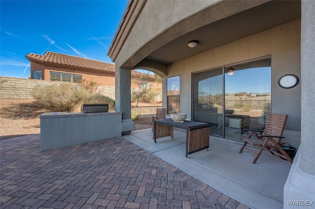 view of patio / terrace with fence