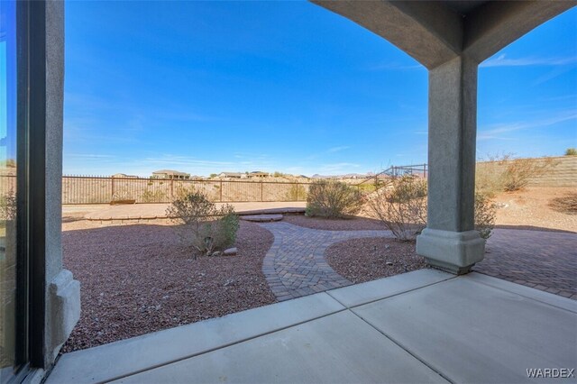 view of yard featuring a fenced backyard and a patio