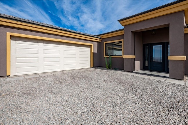 garage with driveway