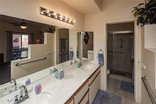 1650 Smoketree Ave Unit 103, Lake Havasu, AZ 86403 - full bathroom featuring tile patterned floors, a stall shower, double vanity, and ceiling fan