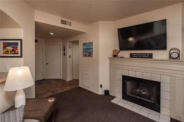 1650 Smoketree Ave Unit 103, Lake Havasu, AZ 86403 - living area with carpet floors and a tile fireplace