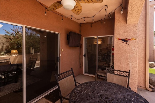 1650 Smoketree Ave Unit 103, Lake Havasu, AZ 86403 - view of patio with outdoor dining area and ceiling fan