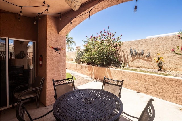 1650 Smoketree Ave Unit 103, Lake Havasu, AZ 86403 - view of patio featuring outdoor dining area