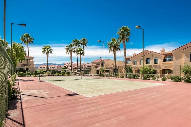 1650 Smoketree Ave Unit 103, Lake Havasu, AZ 86403 - view of tennis court featuring a residential view