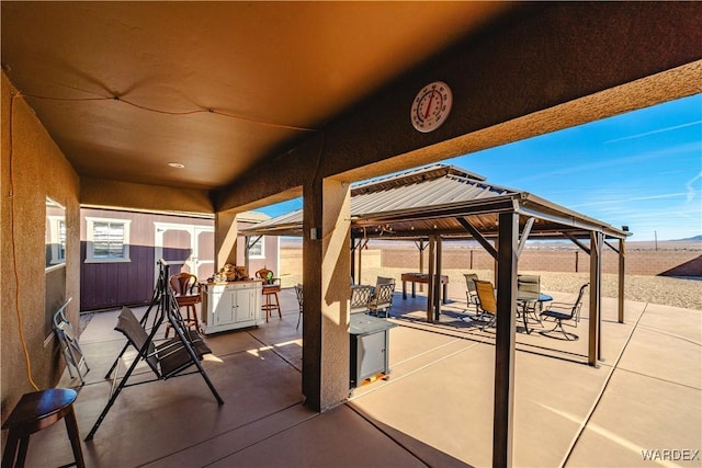 view of patio featuring a gazebo