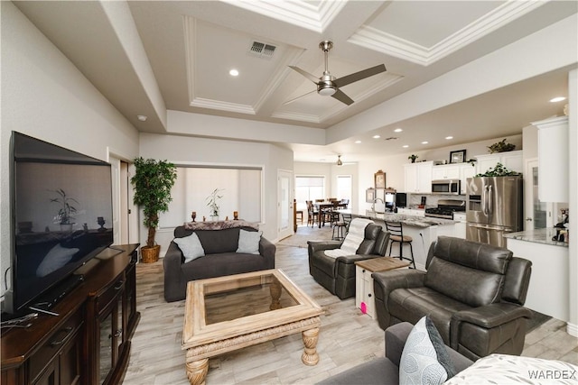 living area with visible vents, coffered ceiling, ceiling fan, crown molding, and recessed lighting