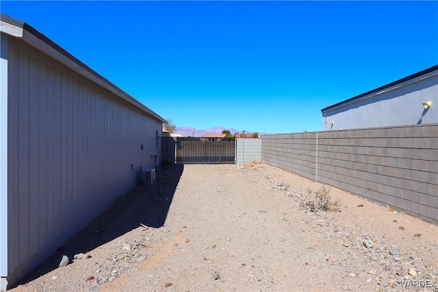 view of yard featuring a gate and fence