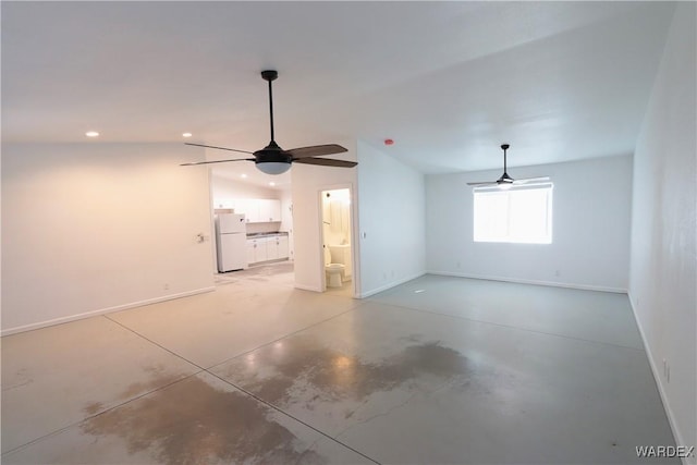 interior space with finished concrete floors, lofted ceiling, recessed lighting, and a ceiling fan