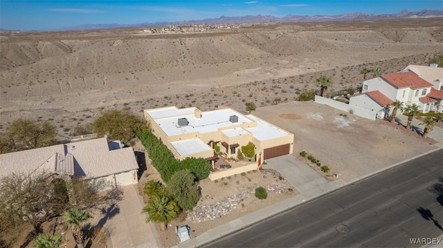 aerial view with view of desert and a mountain view