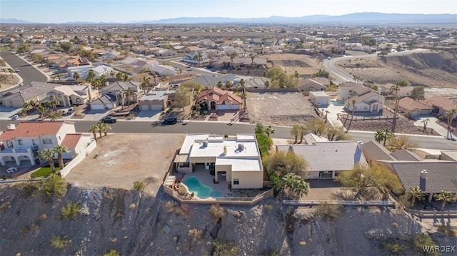 drone / aerial view featuring a mountain view and a residential view