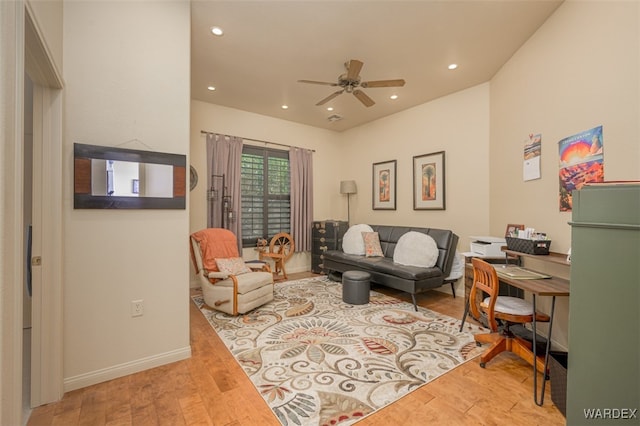 living room featuring recessed lighting, ceiling fan, baseboards, and wood finished floors