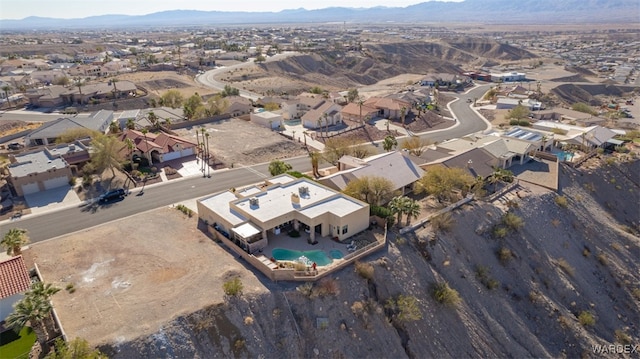 bird's eye view with a residential view and a mountain view