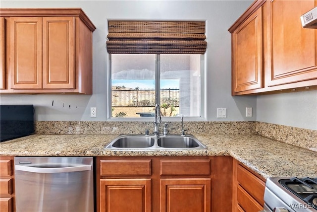 kitchen with light stone counters, a sink, range, brown cabinets, and dishwasher