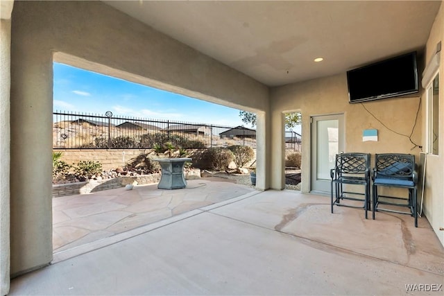 view of patio / terrace with fence