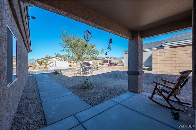 view of patio / terrace with fence